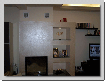 Τζάκι επενδυμένο με πυράντοχη γυψοσανίδα και δικόσμηση με ράφια γυψοσανίδας 